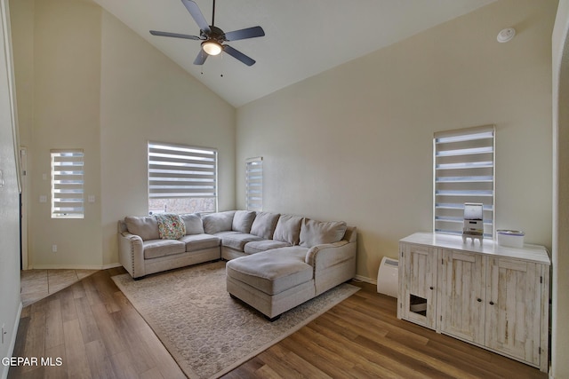 7044 Eagle Nest Ct, El Paso, TX 79934 - living room with high vaulted ceiling, ceiling fan, wood finished floors, and baseboards