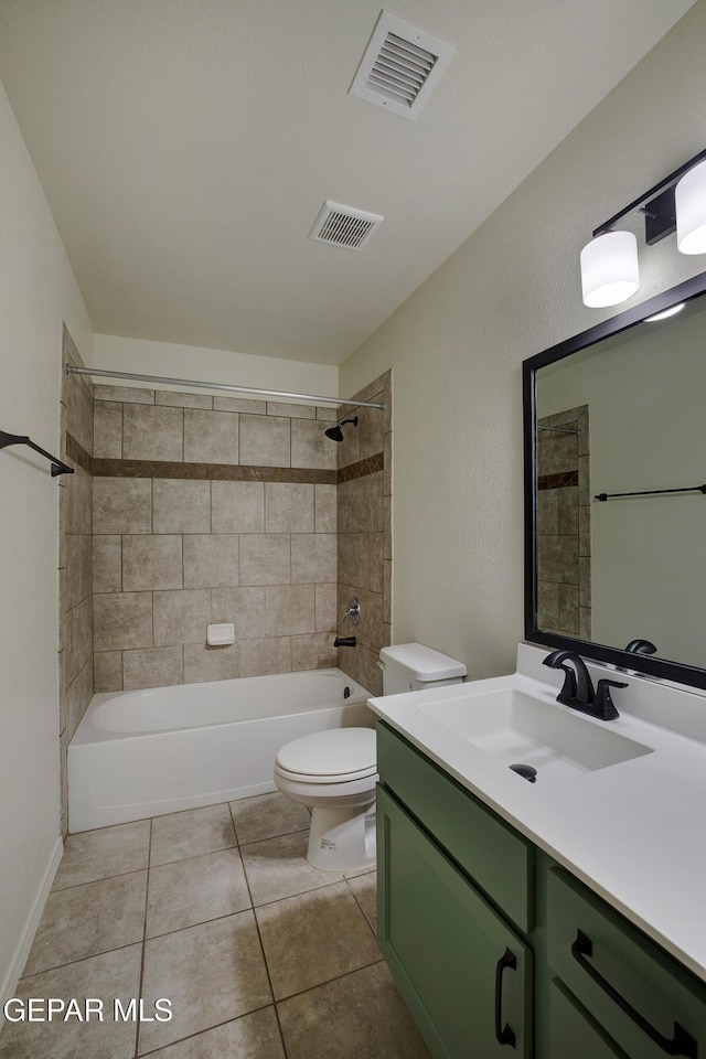 7044 Eagle Nest Ct, El Paso, TX 79934 - full bath featuring vanity, toilet, washtub / shower combination, and tile patterned flooring