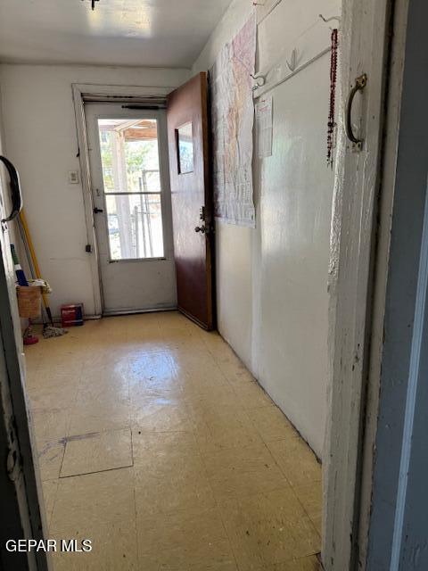 7901 Lirio Rd, El Paso, TX 79915 - doorway to outside with light flooring