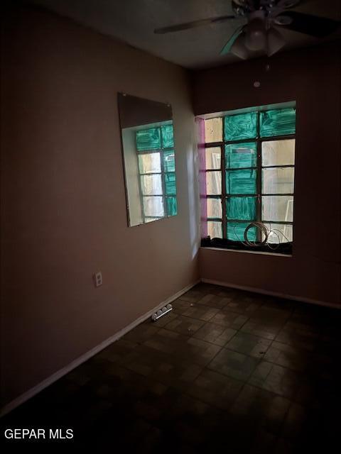 7901 Lirio Rd, El Paso, TX 79915 - unfurnished room with ceiling fan and baseboards
