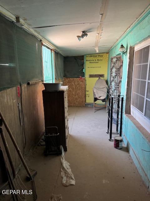 7901 Lirio Rd, El Paso, TX 79915 - miscellaneous room featuring unfinished concrete flooring