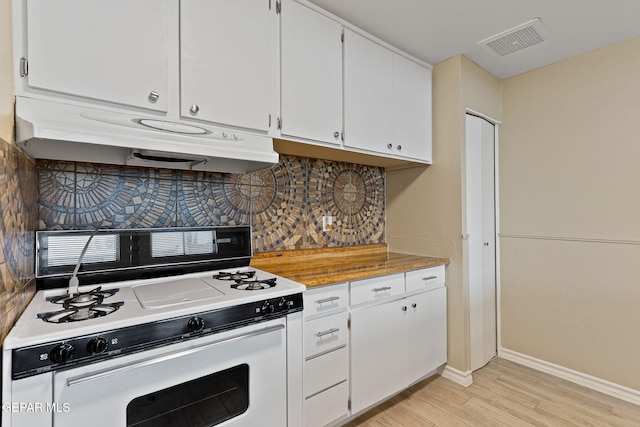 310 Kelvin Ave, El Paso, TX 79915 - kitchen with white gas range, under cabinet range hood, light wood-type flooring, white cabinetry, and backsplash