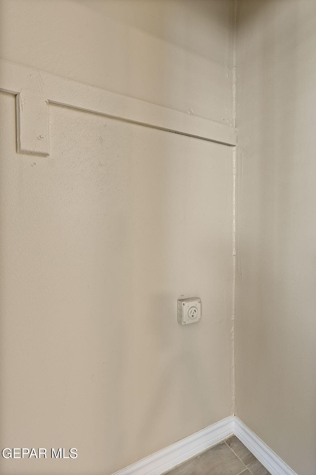 310 Kelvin Ave, El Paso, TX 79915 - laundry area featuring baseboards