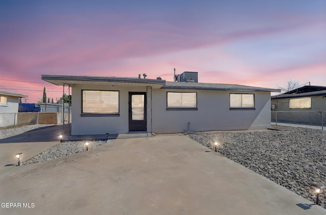 310 Kelvin Ave, El Paso, TX 79915 - ranch-style house with stucco siding and a patio