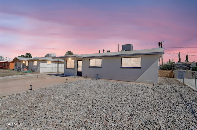 310 Kelvin Ave, El Paso, TX 79915 - ranch-style house featuring stucco siding and central air condition unit