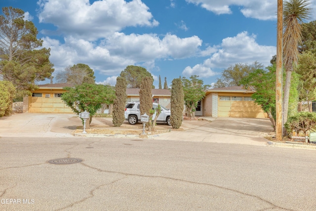 11625 Soberana Ln Unit A & B, El Paso, TX 79936 - view of front of property featuring driveway and a garage