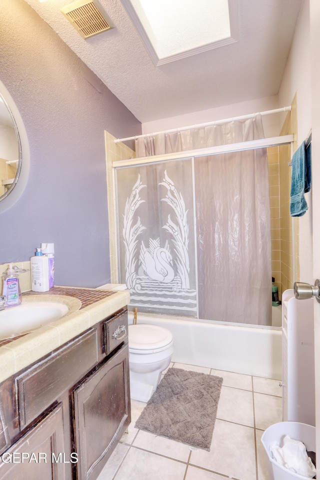 11625 Soberana Ln Unit A & B, El Paso, TX 79936 - bathroom featuring vanity, shower / bathtub combination with curtain, toilet, and tile patterned flooring