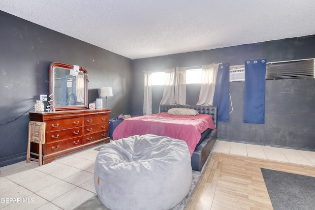 11625 Soberana Ln Unit A & B, El Paso, TX 79936 - tiled bedroom featuring a textured ceiling