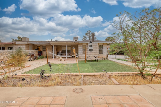 11625 Soberana Ln Unit A & B, El Paso, TX 79936 - rear view of house featuring a patio area and brick siding