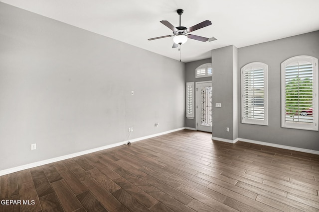 13519 Hazlewood St, El Paso, TX 79928 - spare room featuring a ceiling fan, dark wood finished floors, and baseboards