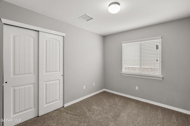 13519 Hazlewood St, El Paso, TX 79928 - unfurnished bedroom featuring carpet flooring, a closet, and baseboards
