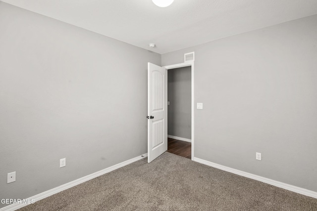 13519 Hazlewood St, El Paso, TX 79928 - carpeted spare room with baseboards and a smoke detector