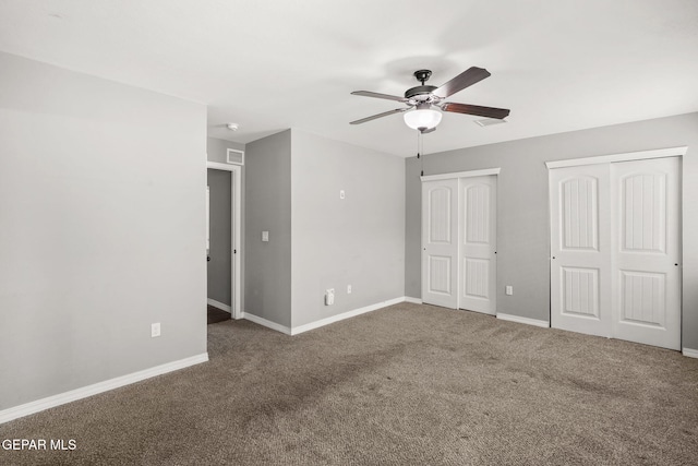 13519 Hazlewood St, El Paso, TX 79928 - unfurnished bedroom featuring two closets, carpet floors, baseboards, and ceiling fan