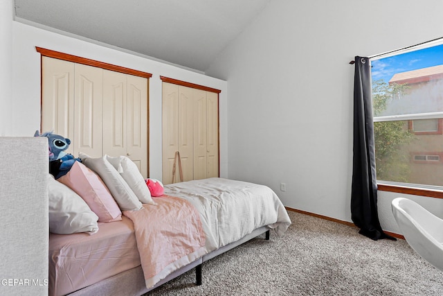 1328 Morgan Marie St, El Paso, TX 79936 - bedroom with carpet, vaulted ceiling, multiple closets, and baseboards