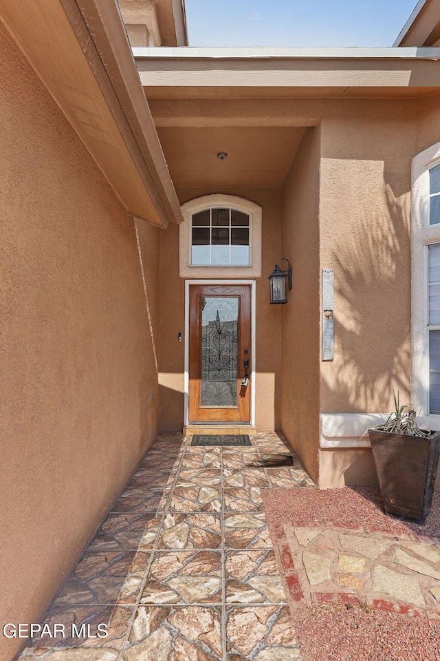1328 Morgan Marie St, El Paso, TX 79936 - view of exterior entry featuring stucco siding