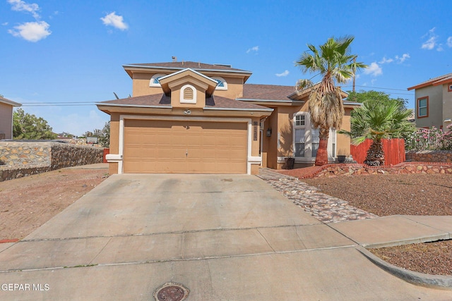 1328 Morgan Marie St, El Paso, TX 79936 - view of front of home featuring stucco siding, driveway, an attached garage, and roof with shingles