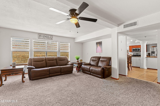 1328 Morgan Marie St, El Paso, TX 79936 - living room with a ceiling fan, decorative columns, light colored carpet, a textured ceiling, and baseboards