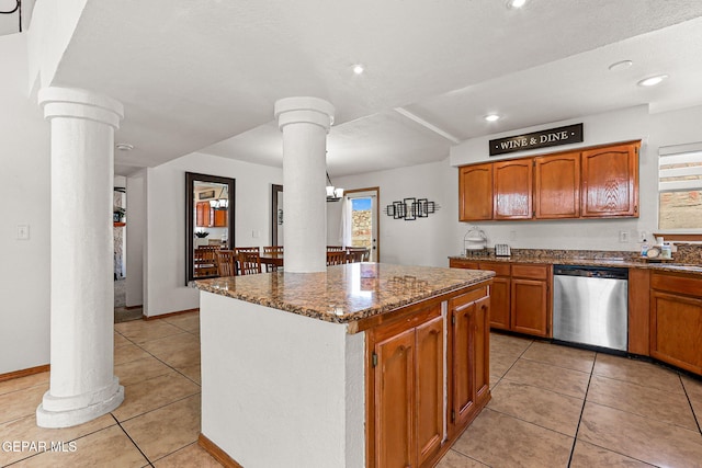 1328 Morgan Marie St, El Paso, TX 79936 - kitchen with dishwasher, ornate columns, light tile patterned floors, a center island, and recessed lighting