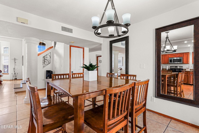 1328 Morgan Marie St, El Paso, TX 79936 - dining space with a chandelier, light tile patterned floors, and baseboards