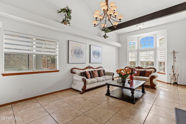 1328 Morgan Marie St, El Paso, TX 79936 - living room featuring light tile patterned flooring, a chandelier, and baseboards