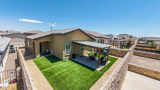 12826 Osmotherly Ave, El Paso, TX 79928 - rear view of property featuring stucco siding, a patio area, a residential view, and a tiled roof