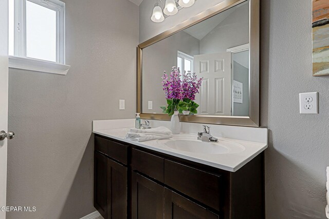 401 Gran Villa Pl, Socorro, TX 79927 - bathroom featuring double vanity, plenty of natural light, and baseboards