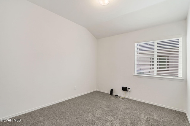 401 Gran Villa Pl, Socorro, TX 79927 - carpeted empty room featuring vaulted ceiling and baseboards