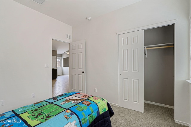 401 Gran Villa Pl, Socorro, TX 79927 - bedroom with a closet, light colored carpet, and baseboards