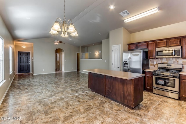 2412 Escape Point St, El Paso, TX 79938 - kitchen with appliances with stainless steel finishes, lofted ceiling, ceiling fan, a center island, and a chandelier