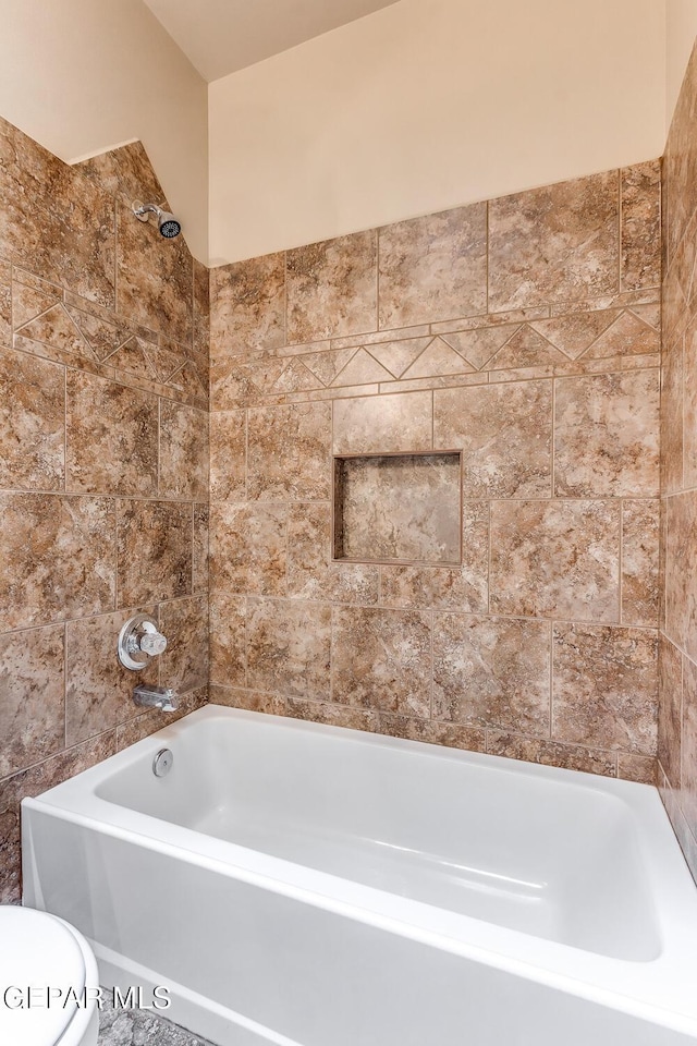 2412 Escape Point St, El Paso, TX 79938 - bathroom featuring toilet and bathtub / shower combination