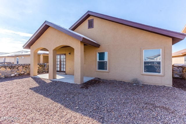 2412 Escape Point St, El Paso, TX 79938 - back of property with stucco siding and a patio