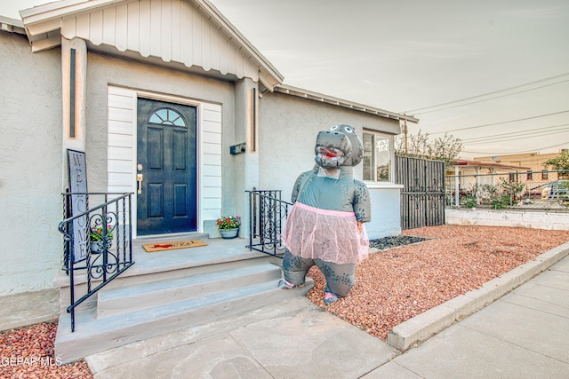 1401 N Boone St, El Paso, TX 79903 - doorway to property with stucco siding