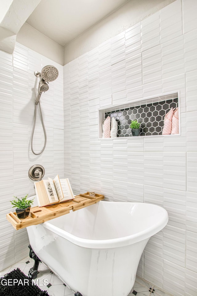 1401 N Boone St, El Paso, TX 79903 - full bathroom with tile walls, a soaking tub, and tile patterned floors