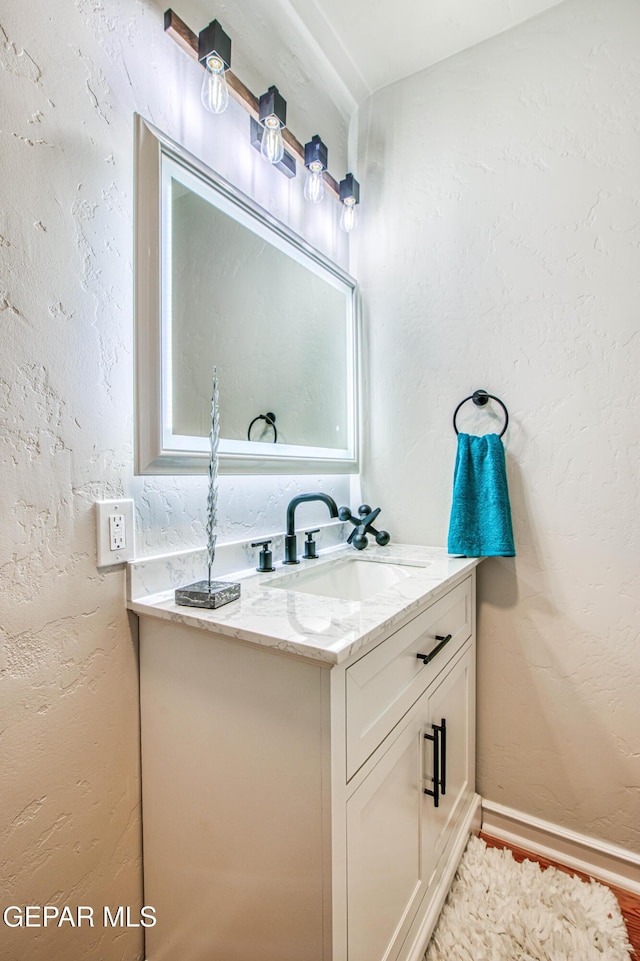 1401 N Boone St, El Paso, TX 79903 - bathroom with vanity and baseboards
