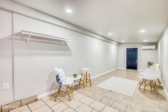 1401 N Boone St, El Paso, TX 79903 - entrance foyer with an AC wall unit, recessed lighting, tile patterned flooring, and baseboards
