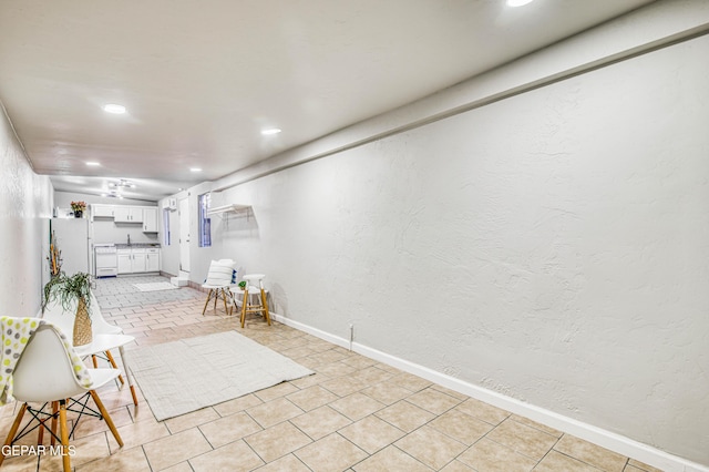 1401 N Boone St, El Paso, TX 79903 - living area featuring baseboards, recessed lighting, and a textured wall