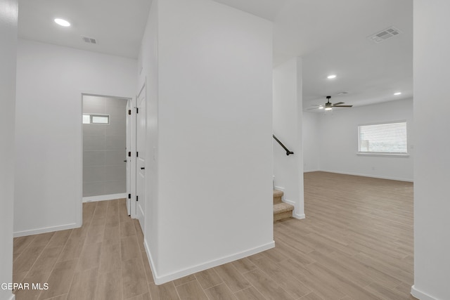 13853 Summer Wave Ave, El Paso, TX 79928 - hallway with light wood finished floors, recessed lighting, and stairs