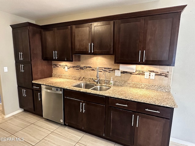 7217 Long Meadow Dr, El Paso, TX 79934 - kitchen featuring stainless steel dishwasher, a sink, backsplash, and light stone counters