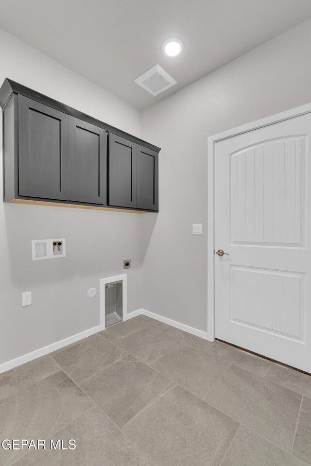 12169 Sanna Dr, El Paso, TX 79934 - laundry room with hookup for an electric dryer, cabinet space, washer hookup, baseboards, and hookup for a gas dryer