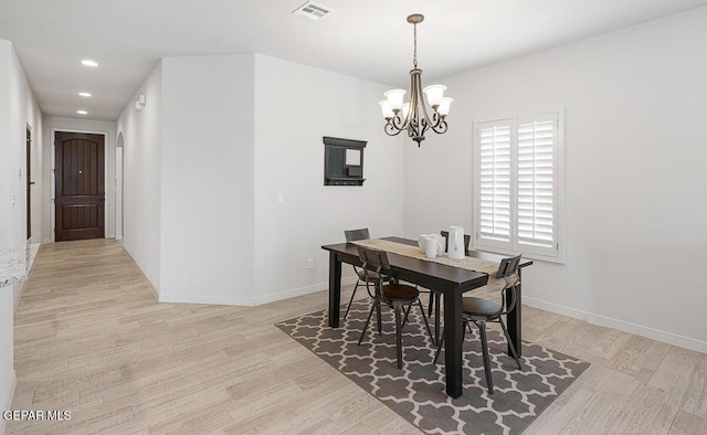 3809 Plan Pl, El Paso, TX 79938 - dining room featuring a chandelier, light wood-type flooring, recessed lighting, and baseboards