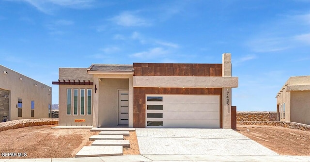 12748 Polo Norte Dr, El Paso, TX 79934 - view of front of property with a garage, decorative driveway, and stucco siding
