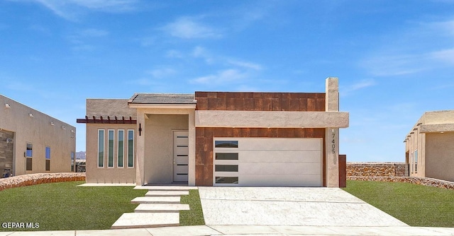 12748 Polo Norte Dr, El Paso, TX 79934 - view of front of property with driveway, a front yard, stucco siding, and a garage
