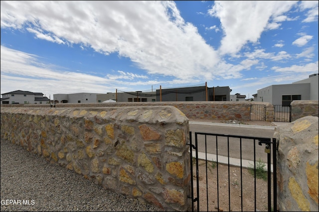 13106 Cleethorpes St, El Paso, TX 79928 - gate featuring a residential view