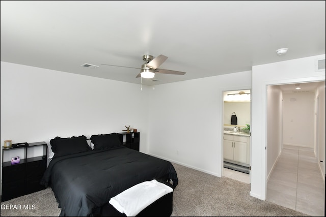 13106 Cleethorpes St, El Paso, TX 79928 - bedroom featuring light carpet, baseboards, ensuite bathroom, a ceiling fan, and a sink