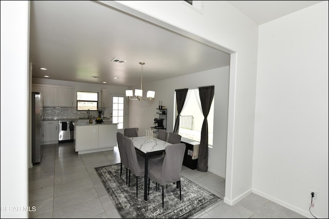 13106 Cleethorpes St, El Paso, TX 79928 - dining area featuring a chandelier, light tile patterned floors, baseboards, and recessed lighting