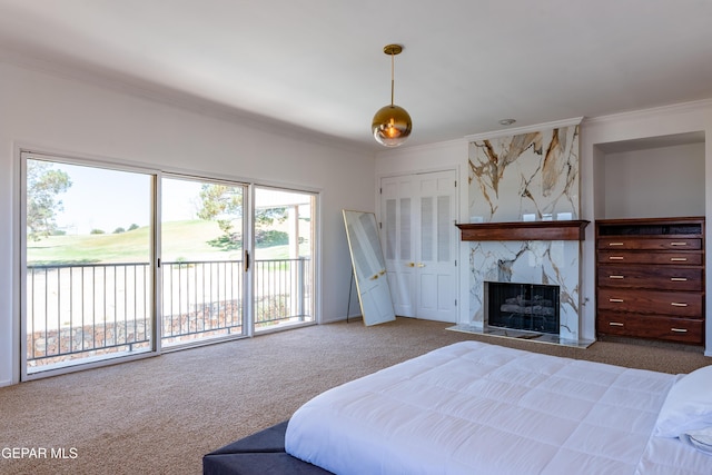 1013 Singing Hills Dr, El Paso, TX 79912 - bedroom with carpet floors, ornamental molding, access to outside, and a high end fireplace