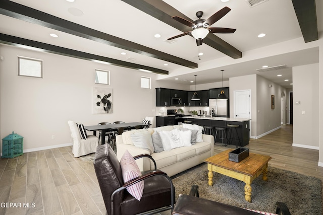 14924 Hill Ridge Ct, El Paso, TX 79938 - living area featuring beam ceiling, recessed lighting, ceiling fan, light wood finished floors, and healthy amount of natural light