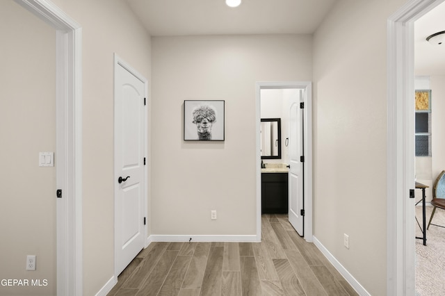14924 Hill Ridge Ct, El Paso, TX 79938 - corridor with light wood-type flooring