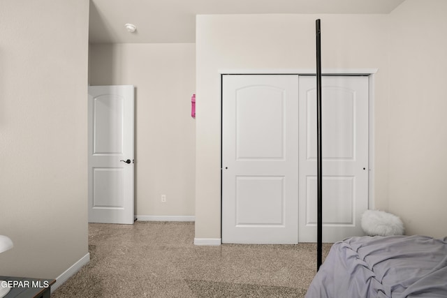 14924 Hill Ridge Ct, El Paso, TX 79938 - carpeted bedroom with baseboards and a closet