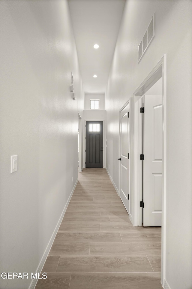 14932 Hill Ridge Ct, El Paso, TX 79938 - corridor with baseboards, recessed lighting, and light wood finished floors